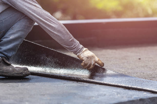 Professional Waterproofing technician working in Laurel, MD